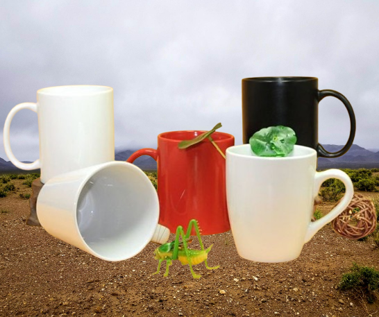 A colorful display of various custom-printed ceramic mugs