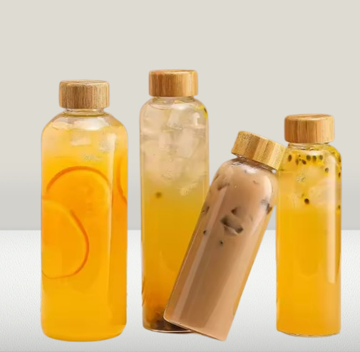 Custom Size Logo Style 550 ml Eco-friendly Glass Water Bottles with Bamboo Lid Silicone Sleeve Durable