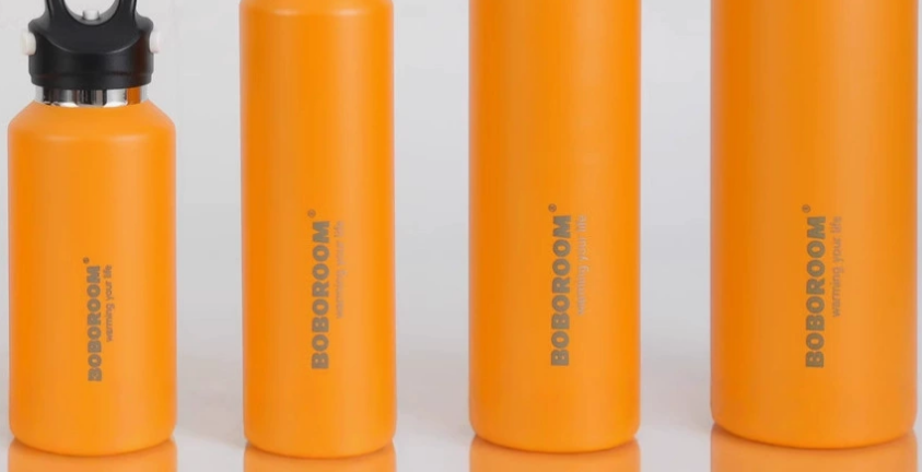 a side-by-side comparison of a laser-engraved bottle and a colorfully UV-printed bottle