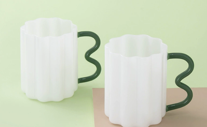 a minimalist modern room featuring a single, elegant milk glass vase as a focal point