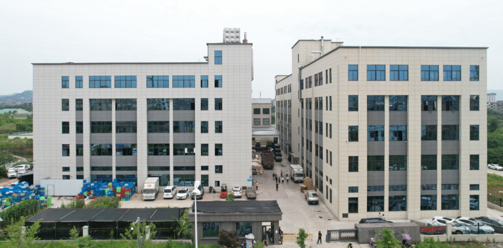 An aerial view of a massive and modern manufacturing district with countless factory buildings